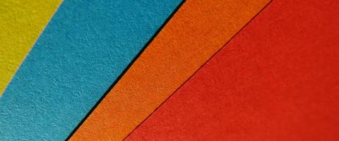 Colored cement blocks stacked on top of one another