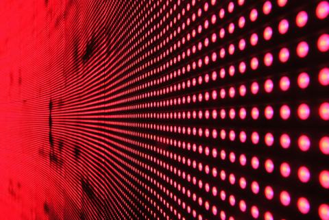 A wall of red neon dots